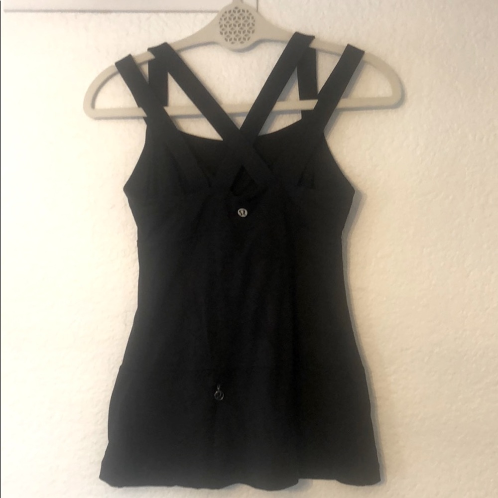 Lululemon tank w/built in shelf bra. Great for a workout or a casual day out.